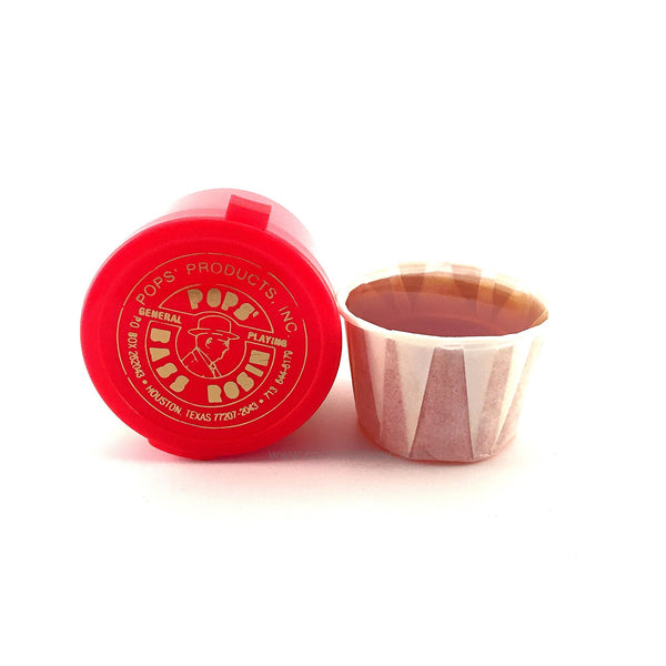 Pops Bass Rosin in white cup shown with red flip-top container